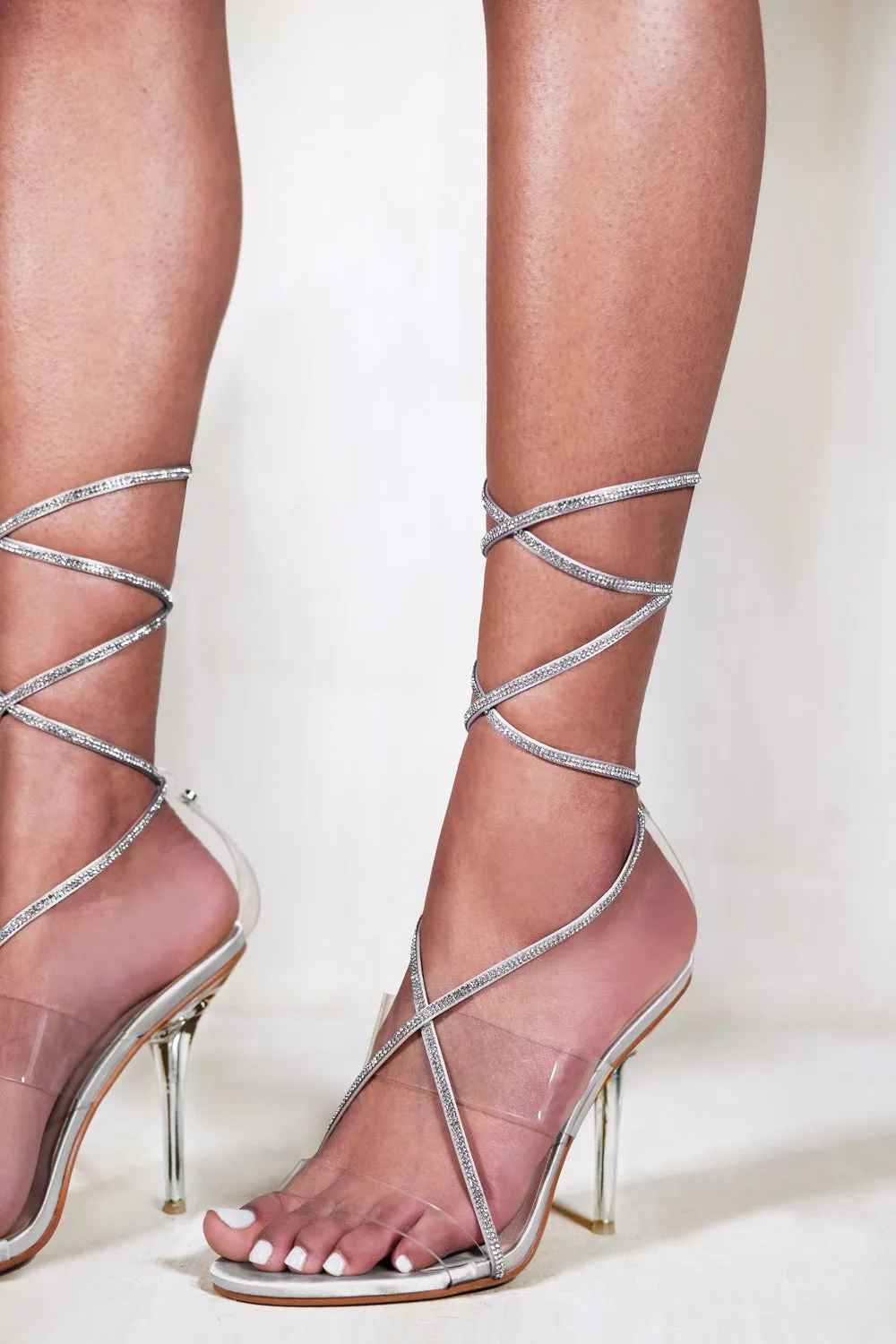 SLOANE DIAMANTE HIGH HEEL WITH PERSPEX STRAP & LACE UP DETAIL IN MOON SILVER